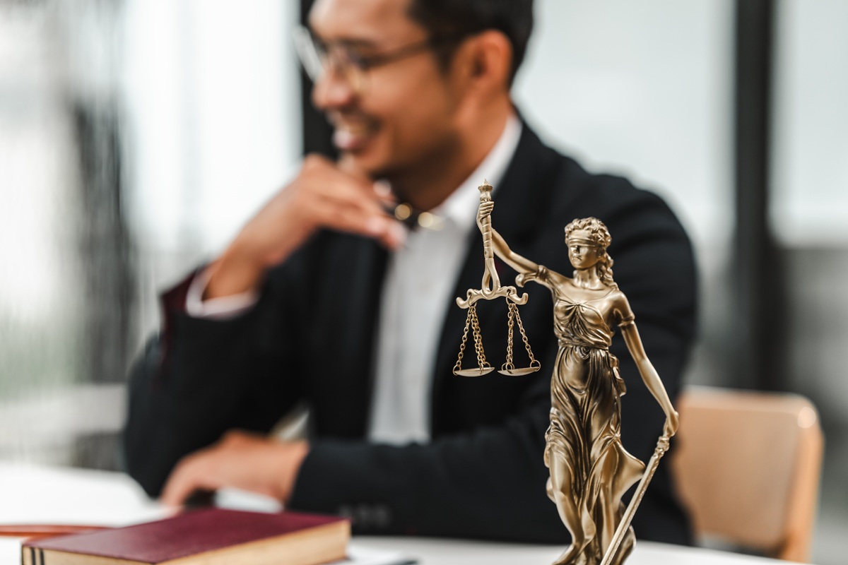Handsome businessman lawyer of Indian descent. trusted litigation lawyers attorneys.